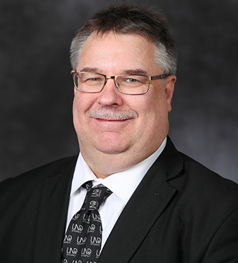 David
                        Delene's Headshot